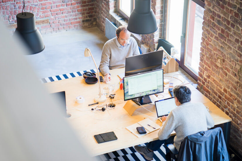 People working in a start up office